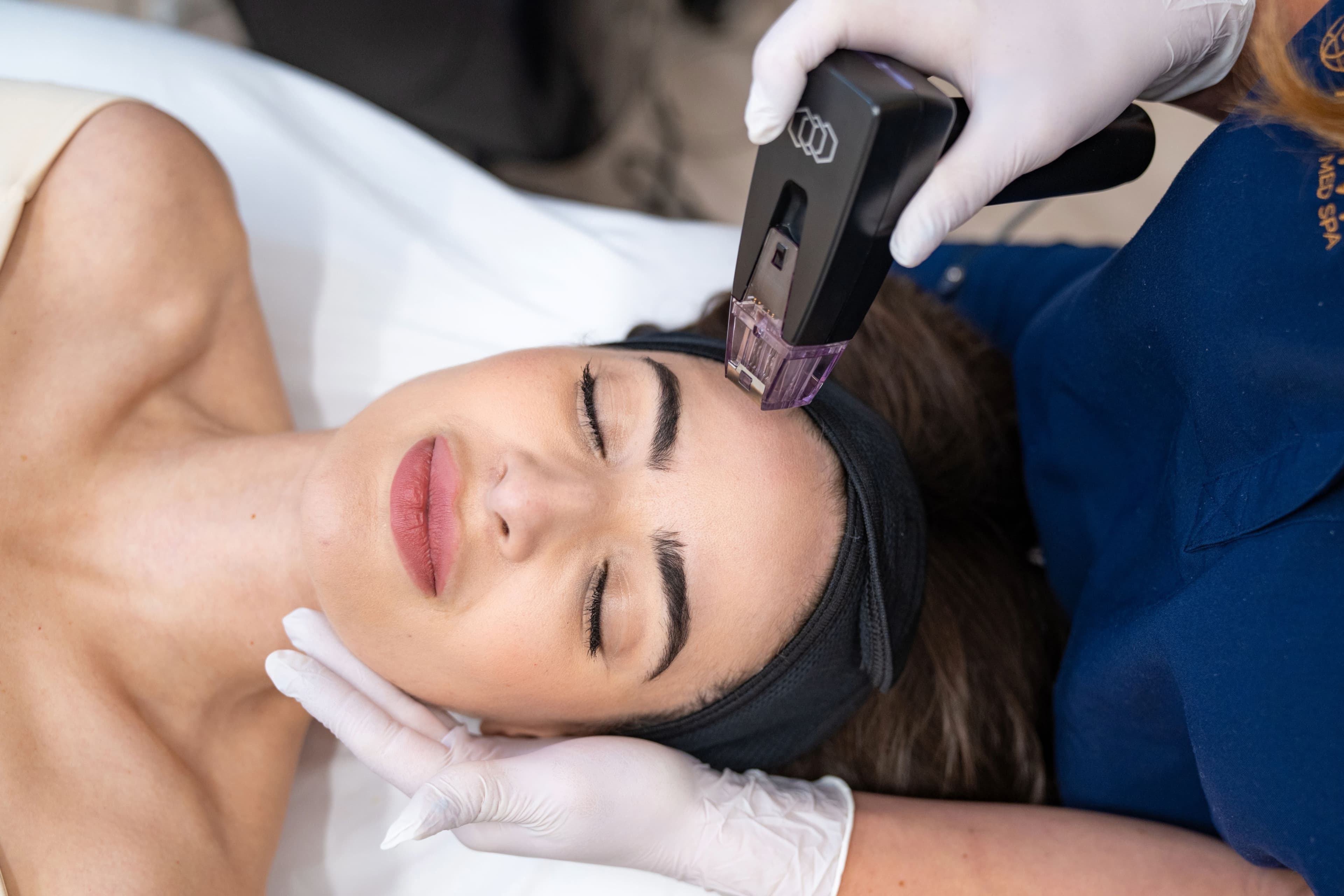 Woman receiving Morpheus8 treatment